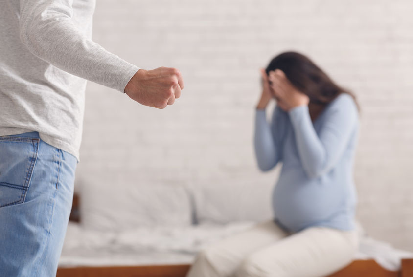 Pregnant woman suffering from domestic abuse from husband